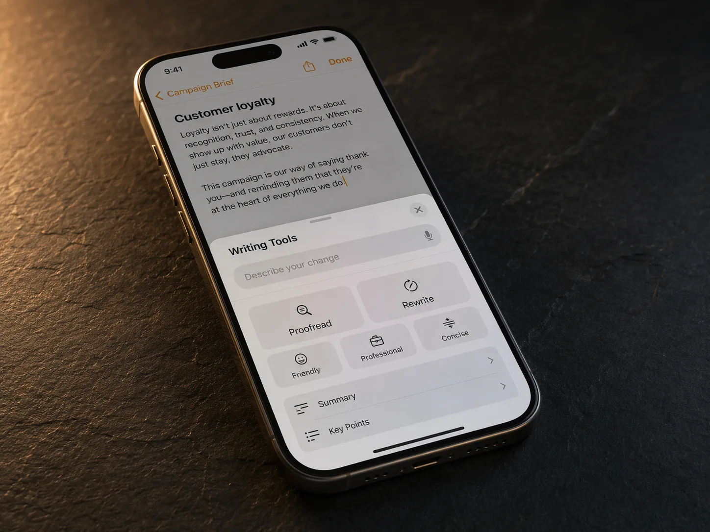 iPhone showing the Apple Intelligence system Writing Tools sheet inside a custom native app